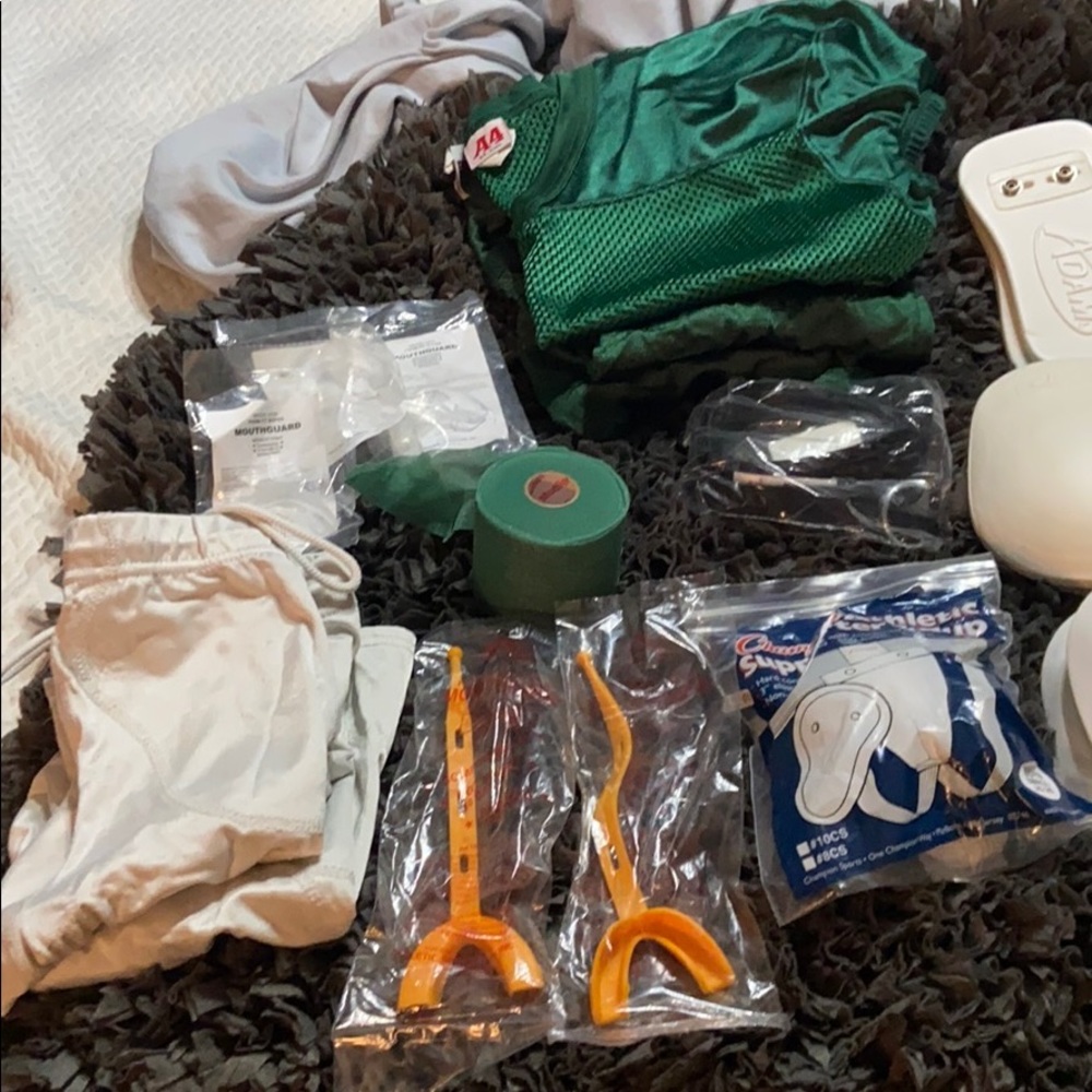 Box of boys football gear etc